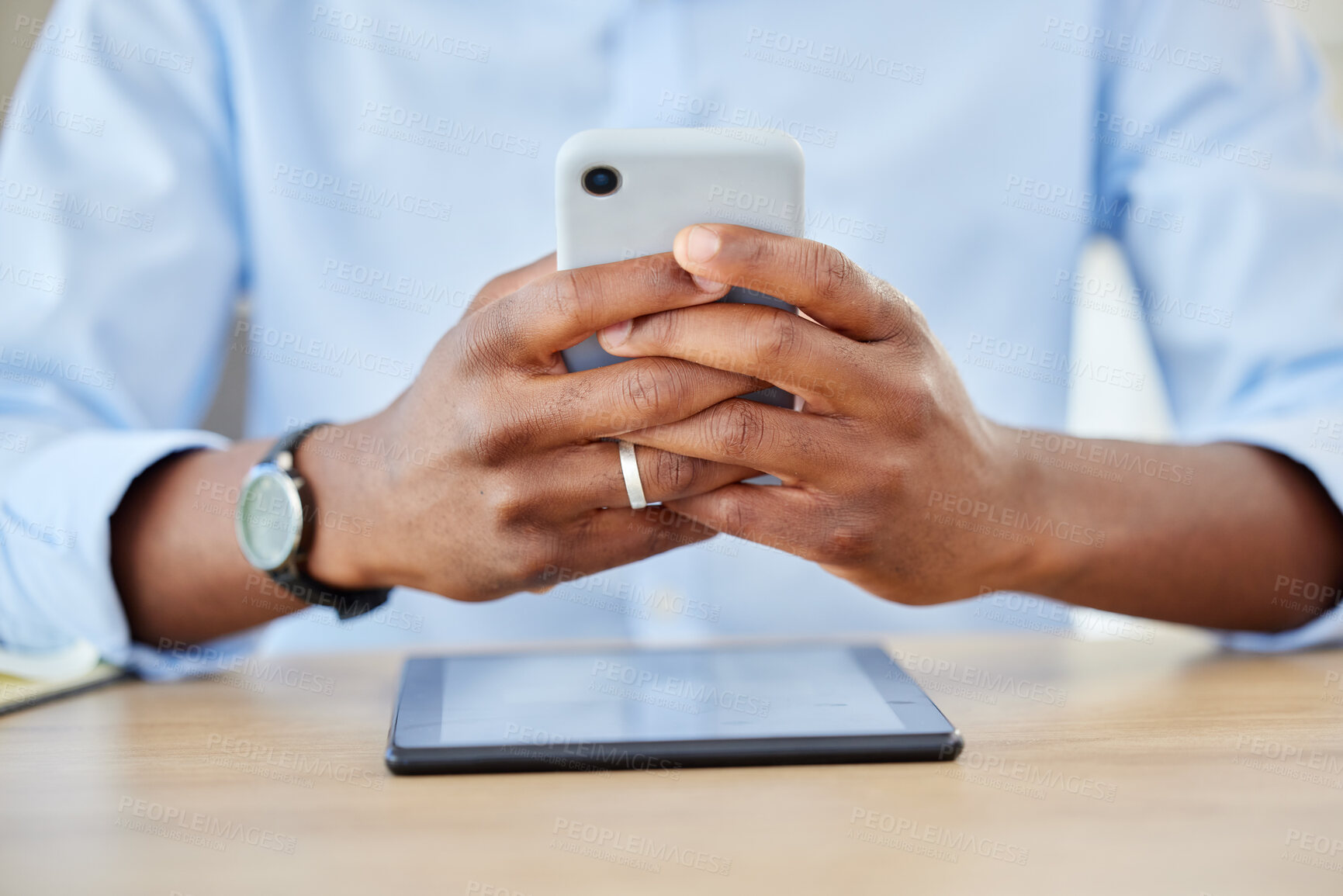 Buy stock photo Phone, communication and business man working and texting with 5g network, social media and chatting on messaging app on smartphone at desk. Closeup hands of professional worker checking email 