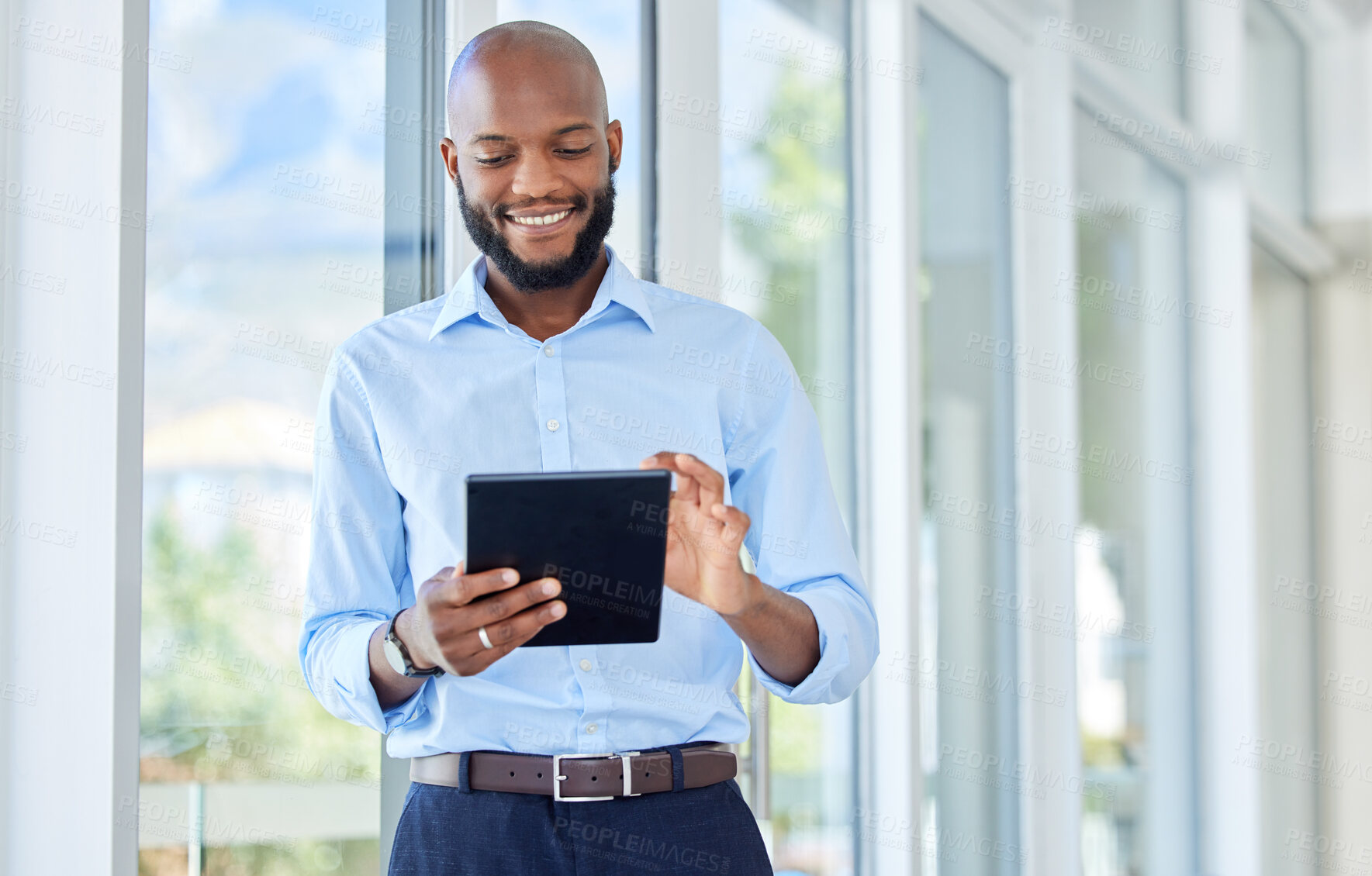 Buy stock photo Happy businessman with digital tablet check the online stock market or money trading. Corporate Black man or worker smile at fiance profit and growth of investment on the internet in a startup office