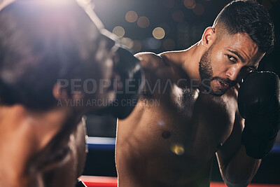 Buy stock photo Training, wellness and fitness boxing punch man with exercise, workout and fight in dark arena, studio or gym. Sports, boxer and coach fighting for health in competition, extreme tournament or event.