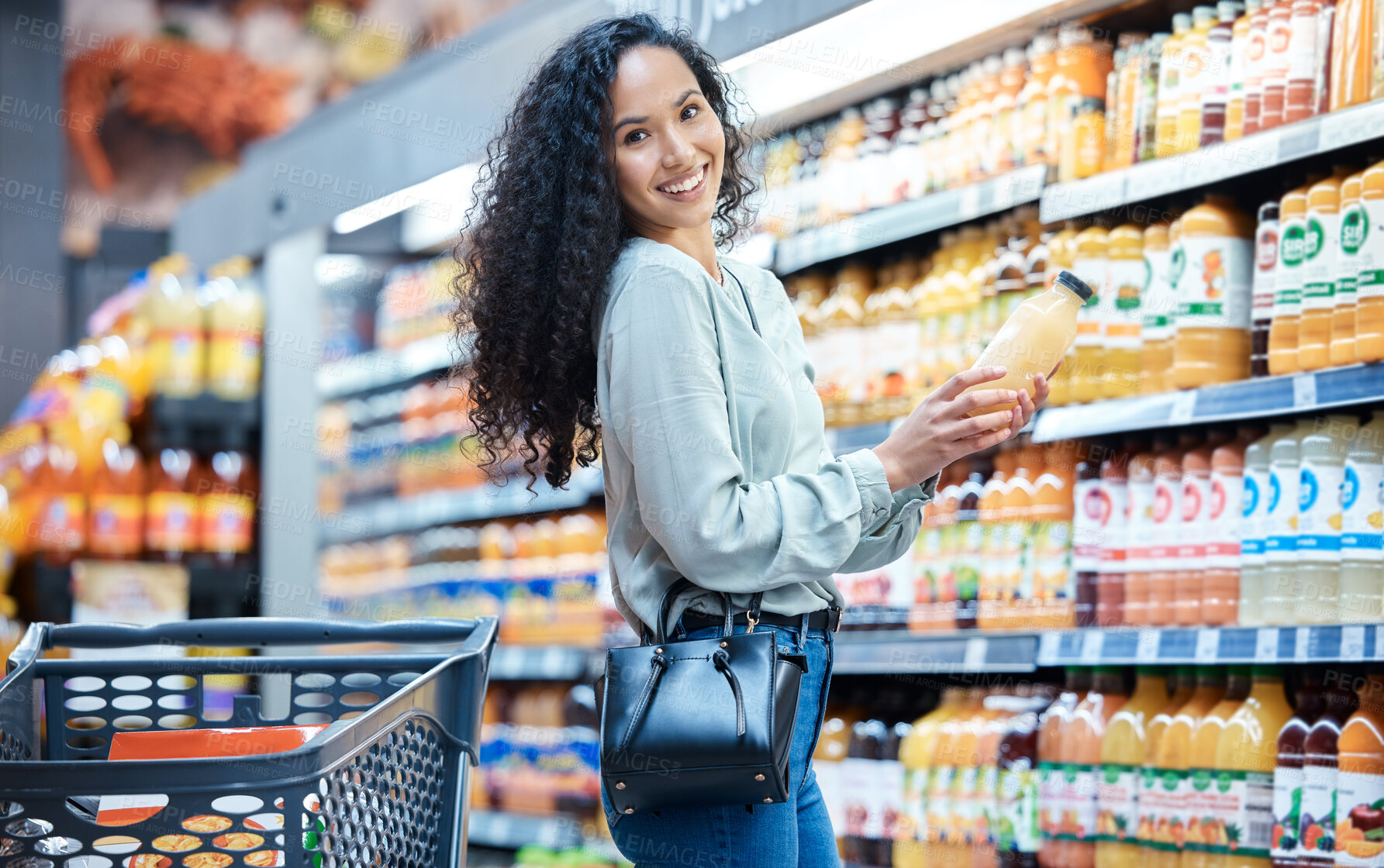 Buy stock photo Portrait of a woman with juice while shopping in a grocery store with a retail product sale. Happy customer with a wellness, health and diet lifestyle buying healthy groceries at a supermarket.