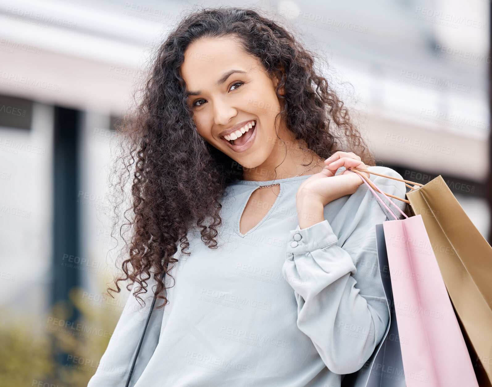 Buy stock photo Woman, shopping bags or city retail fashion customer on street or road with Spain building background. Portrait, smile or happy beauty model with store gift present, discount sales clothes or product