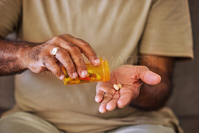 Buy stock photo Medicine, healthcare and pills in the hands of a senior man sitting on a sofa in the retirement home. Prescription, medication and antibiotics for chronic treatment and wellness with a pensioner