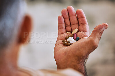 Buy stock photo Senior hand of man with pills, medicine or medication for disease, cancer or health at home. Wellness, healthcare or sick elderly retired person with medical drugs, aspirin or antibiotics in palm.