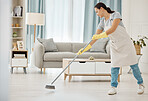 Living room, asian housewife and sweeping floor for home interior spring clean and tidy habit. Housekeeping woman cleaning dust, dirt and grime in apartment room for good hygiene lifestyle.