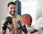 Fitness boxing, happy man training workout and cardio exercise motivation goals. Healthy body wellness athlete, strong ab muscle power and shirtless young sports boxer smiles in gym with gloves
