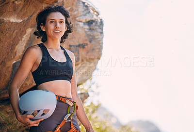 Buy stock photo Hiking, adventure and rock climbing woman on mountain for fitness, wellness or healthy lifestyle goals, mission and portrait. Mountaineering professional athlete with safety gear, nature and mockup
