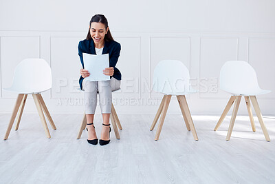 Buy stock photo Paper, recruitment and hiring of business woman in a waiting room for a corporate company job interview. Excited, smile and contract for job success, promotion or new career while reading a document