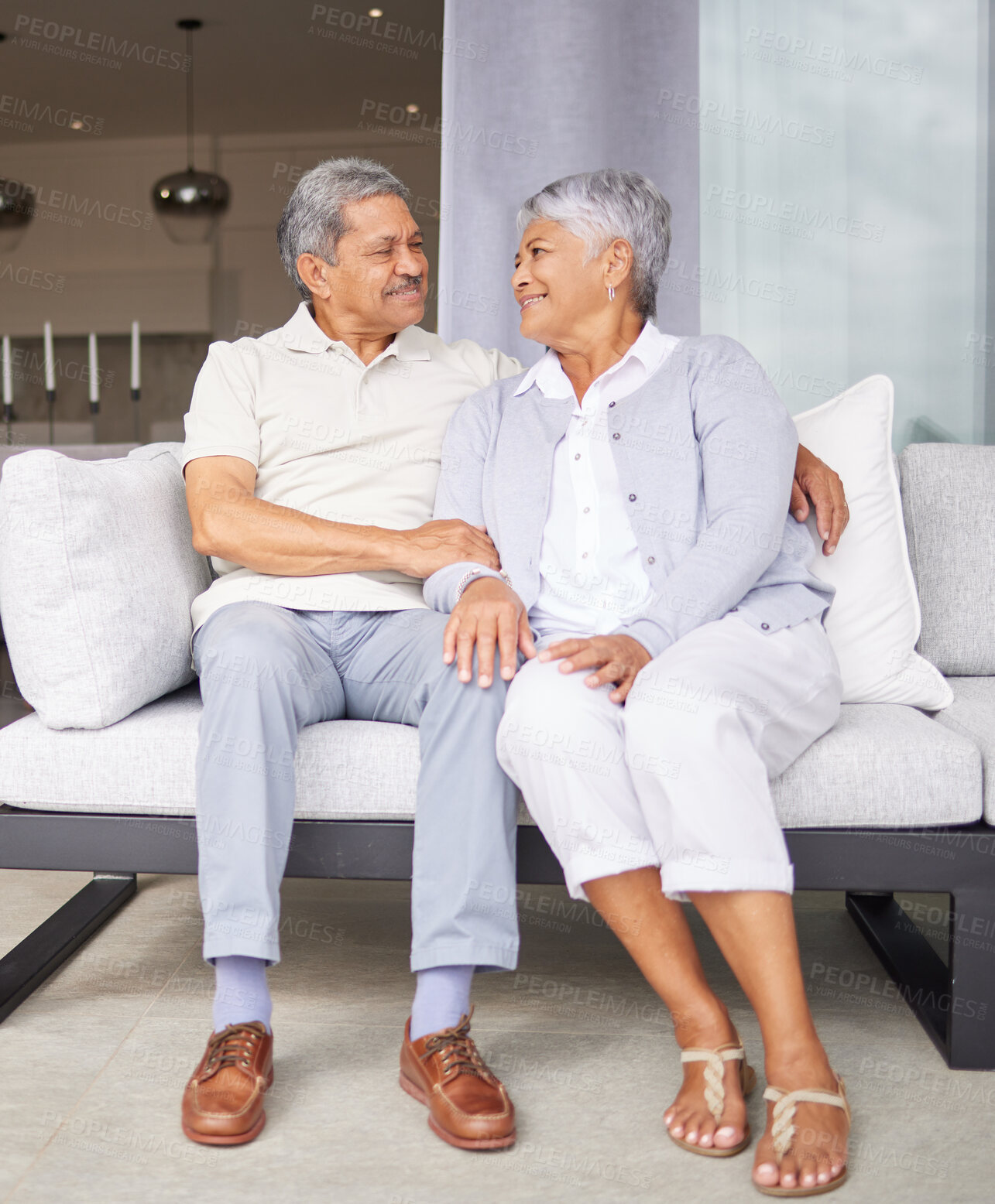 Buy stock photo Retirement, love and marriage with senior couple sitting on sofa together for care, support and wellness. Elderly, trust and embrace with old age married man and woman in family home 