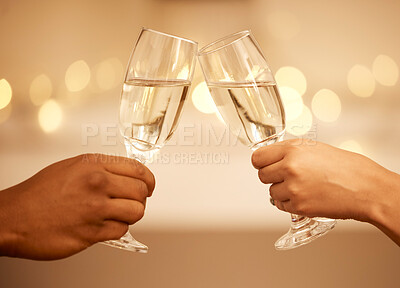 Buy stock photo Champagne, toast and hands, a celebration with couple on romantic date drinking with bokeh. Love, romance and luxury, a man and woman cheers to hope of future relationship goal with glass and bubbles