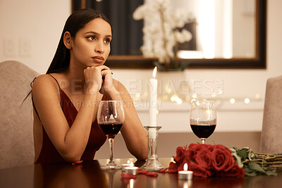 Buy stock photo Wine, candle and roses, a woman waiting for date in a romantic restaurant. Engagement or valentines, a beautiful lady, sad and annoyed alone at a table. Rose petals, disappointment and a romance fail