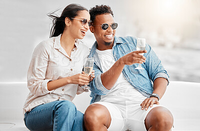 Buy stock photo Couple date, champagne celebration and comic conversation at birthday dinner, happy with alcohol and smile for love marriage in the city. Man and woman on terrace with glass of wine in summer