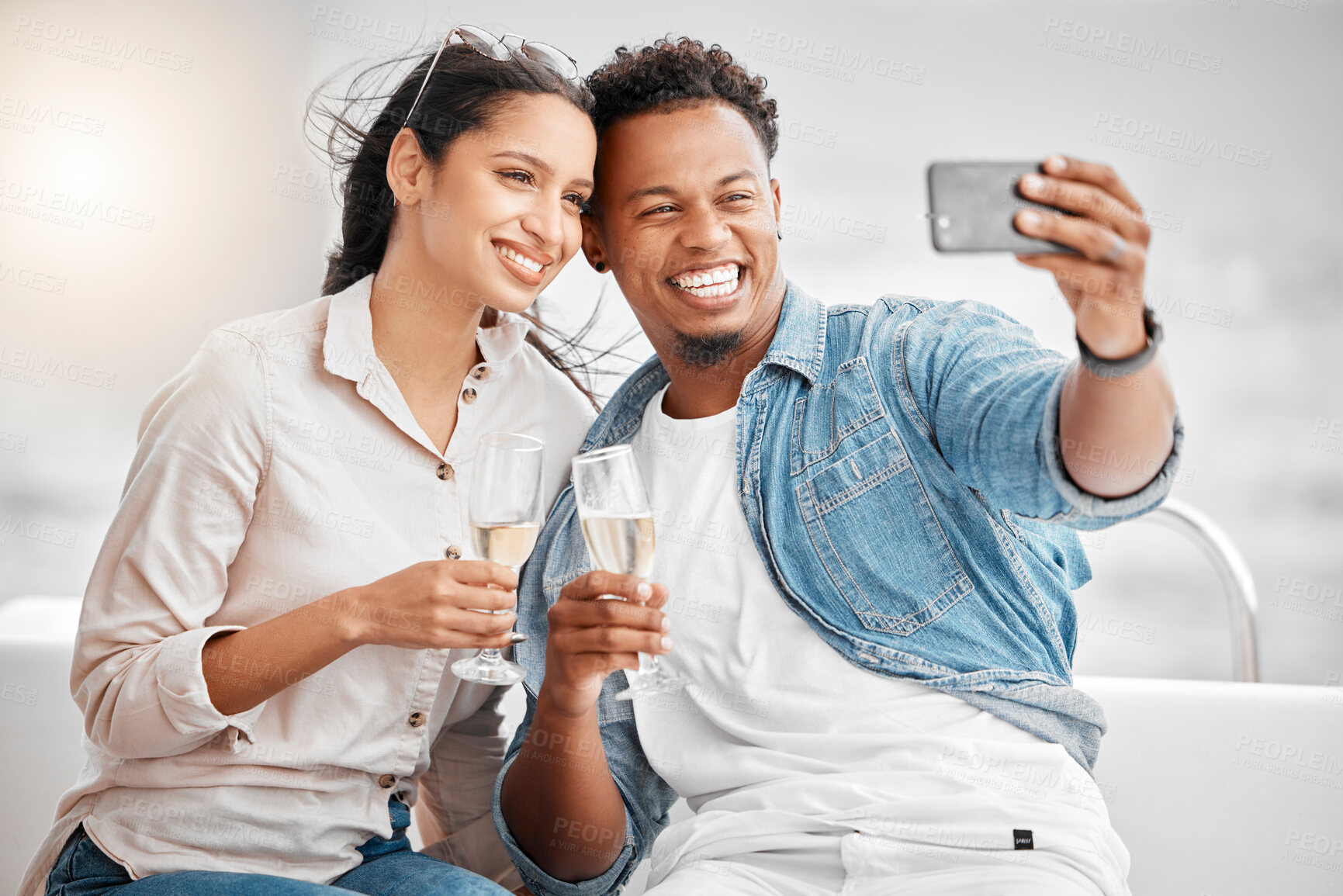 Buy stock photo Couple selfie, luxury boat cruise and champagne wine glass celebration for anniversary, honeymoon and love in Miami Florida. Happy man, smile woman and yacht party photos, travel and summer sea relax