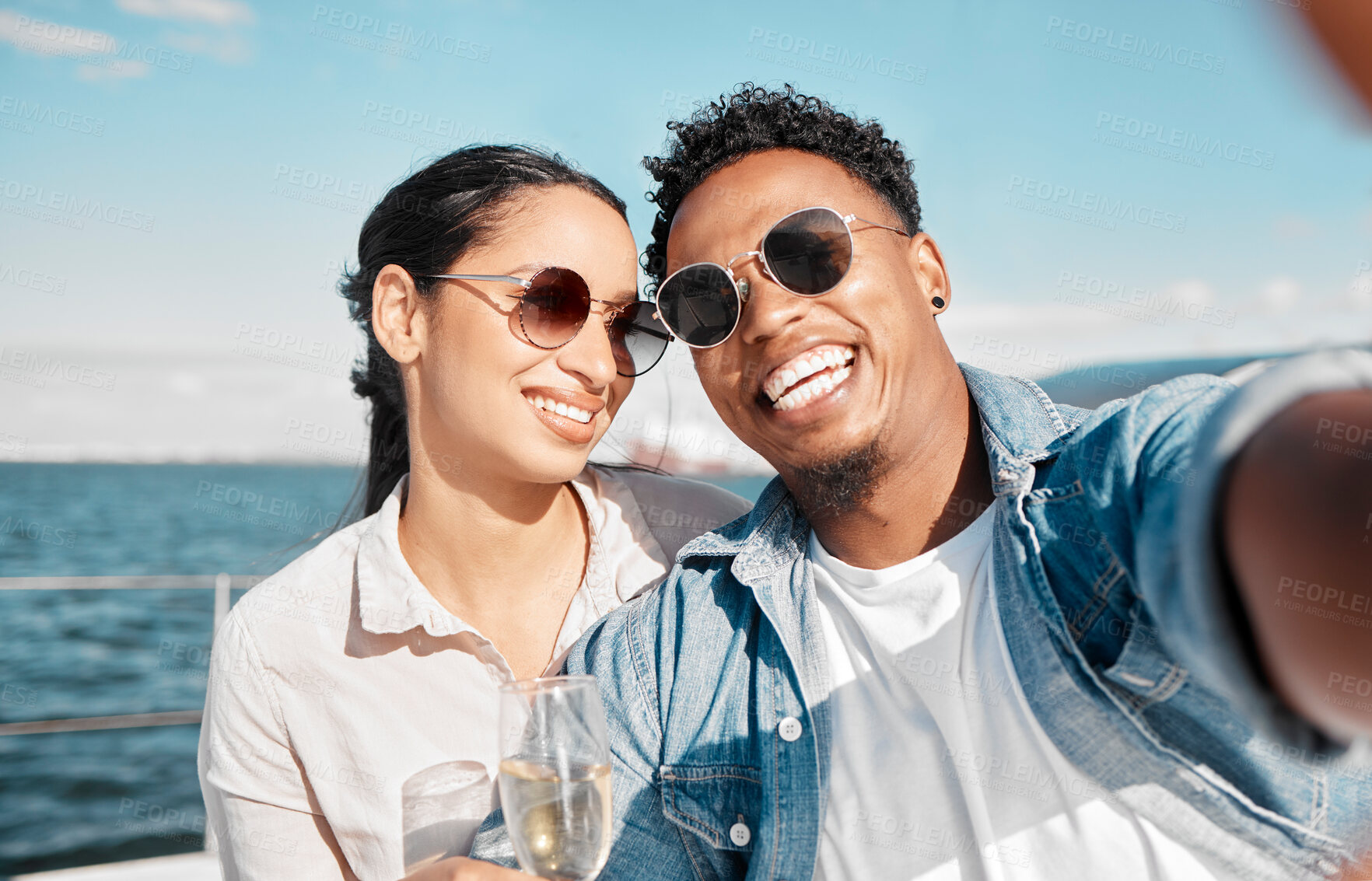 Buy stock photo Couple selfie on yacht in ocean celebrate with champagne on vacation or holiday in summer. Happy young man with luxury wine, cruise at sea with woman for celebration or honeymoon travel on ship