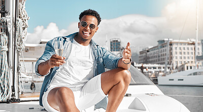 Buy stock photo Champagne drink, yacht vacation and man on holiday in Miami, happy on a boat in the sun and international summer. Portrait of African person smile, excited and relax on luxury deck in the sunshine