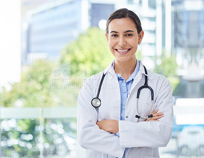 Buy stock photo Healthcare, doctor or nurse woman with stethoscope in hospital, bokeh and happy with smile. Health, trust and mission professional medical expert or worker with wellness motivation and vision
