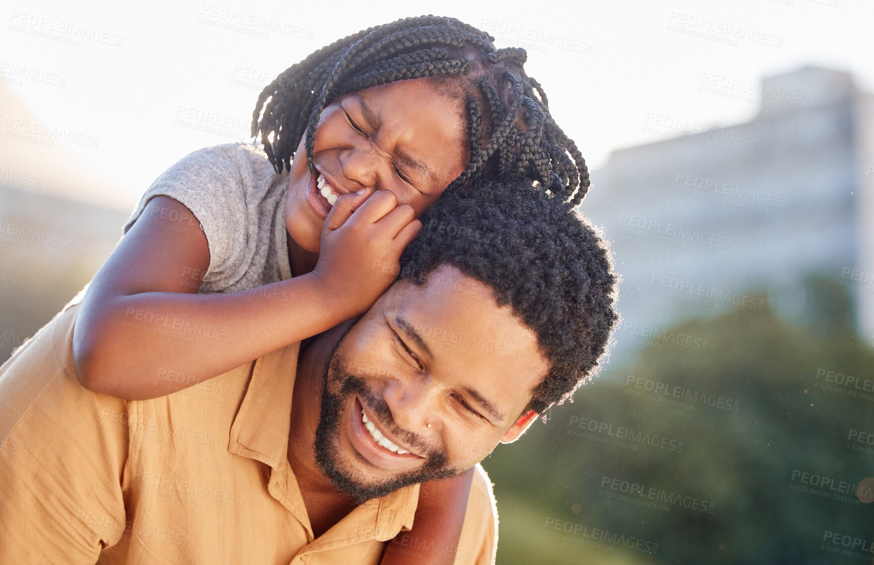 Buy stock photo Happy, black father and daughter smiling on back in joyful happiness and bonding in the outdoor nature. African little girl smile, laughing and enjoying time with caring dad in the summer outside