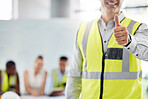 Thumbs up, success and happy architect man standing against a blurred background. Support, welcome or thank you with industrial construction designer designing a building architecture project at work