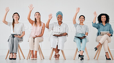 Buy stock photo Diversity, team and row sitting with hands up for question, answer or idea at the office, seminar or meeting. Happy creative business people waving hand together in corporate networking interview