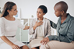 Group of women at work, support friend during sad divorce or time of grief while on lunch. Friends show care listening to woman with mental health issue, depression or stress together while at office