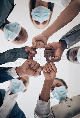 Buy stock photo Fist, covid face mask or business people unity, teamwork compliance or collaboration to stop global bacteria. Zoom on worker hands or office women in support, trust or motivation against corona virus