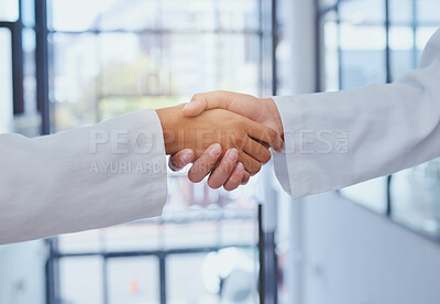 Buy stock photo Doctors meeting, shaking hands and partner at hospital with lab coats. Scientist or doctor agree on medical business, support and cooperate together with handshake to show collaboration and teamwork