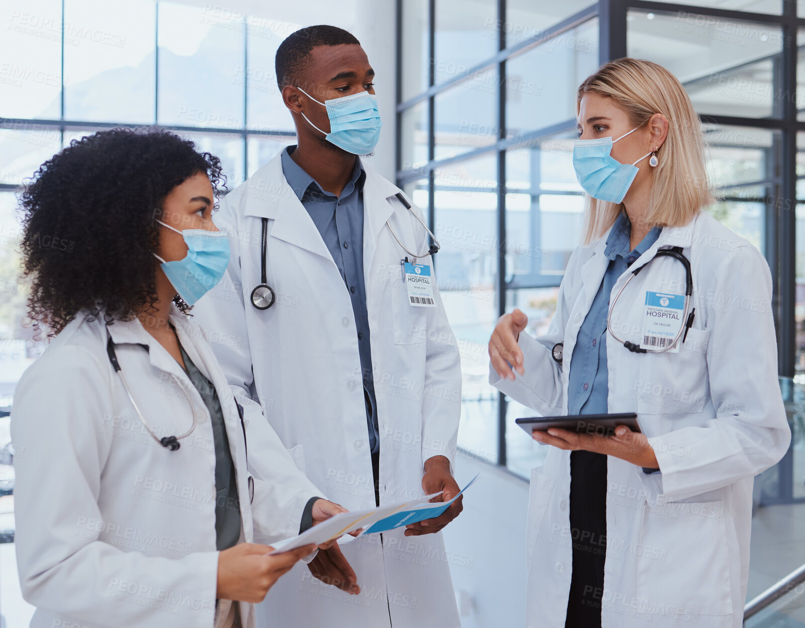 Buy stock photo Covid, doctor and team communication with mask talk about medicine or corona virus pandemic. Diversity group of people, medical healthcare worker or hospital employee in covid 19 chat