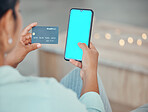 Ecommerce, credit card and woman with phone mockup in hand for payment, online shopping and banking. Female using fintech app and paying on internet with blue screen website app on smartphone
