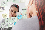 Sticky notes, mirror and woman taking a picture on a smartphone with a sad and confused face. Upset and unhappy girl reading motivational, positive affirmation and self care post it reminder.