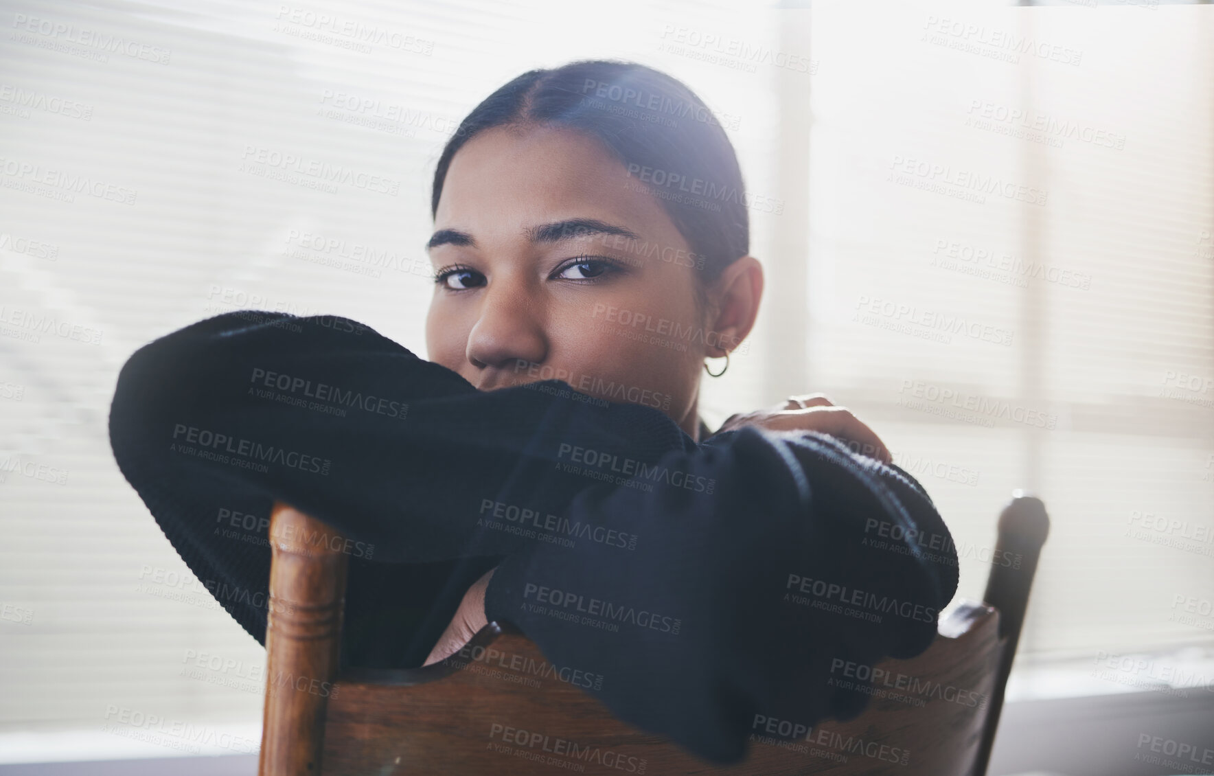 Buy stock photo Depression, mental health and anxiety for girl on chair with stress from life, problem and loneliness. Portrait of a sad, lonely and depressed gen z teen woman suffering from mind or mental disorder