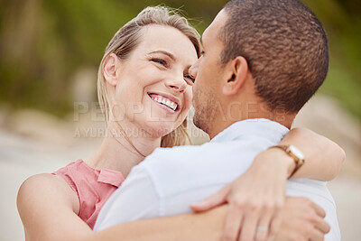 Buy stock photo A happy, love and diversity couple hug outside on their honeymoon, vacation or holiday. Man and woman together in relationship embrace, romantic bond and loving on a sunny day celebrate anniversary. 