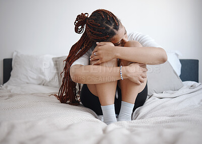 Buy stock photo Depression, anxiety and sad woman on bed with a mental healthy problem. Suicide, depressed or insomnia and young girl crying, heartbroken or stress in her bedroom for fail, mistake or fear