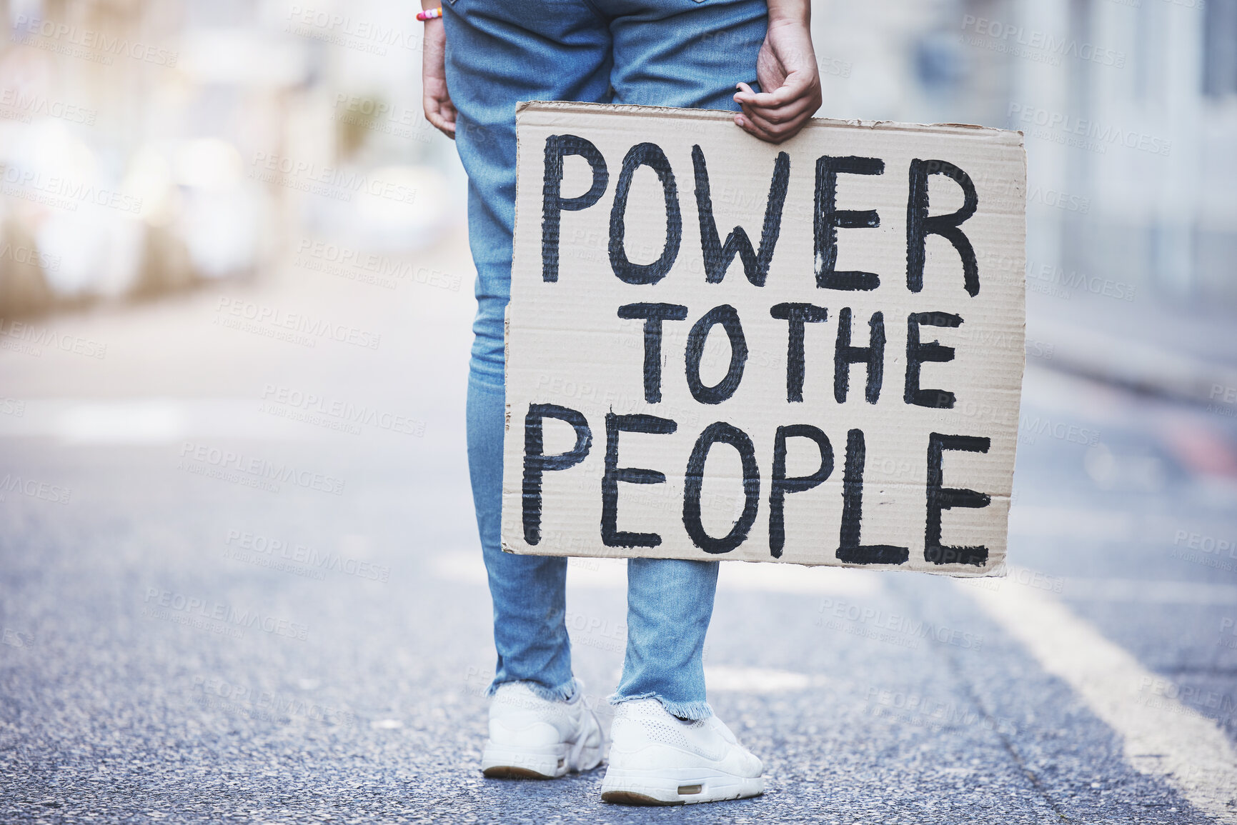 Buy stock photo Power to the people cardboard protest poster in a city street for politics, government or human rights. Voice opinion board for freedom, equality or sign for society, racism and poverty background