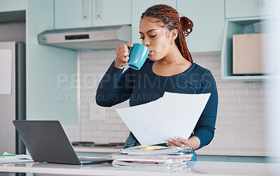 Buy stock photo Business woman working remote drinking coffee, analytics or manager with laptop in kitchen, analyzing paperwork and report. Black woman, worker or employee with finance, accounting or tax audit data