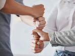 Hand, teamwork and collaboration with the hands of business people working as a team or group in the office. Trust, solidarity and synergy with workforce staff standing in a huddle together at work