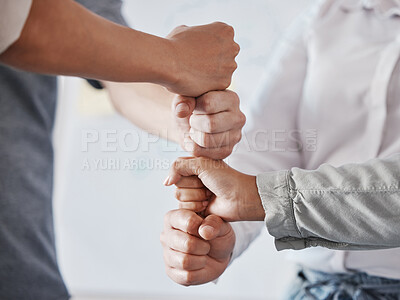 Buy stock photo Hand, teamwork and collaboration with the hands of business people working as a team or group in the office. Trust, solidarity and synergy with workforce staff standing in a huddle together at work