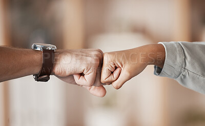 Buy stock photo Hands, teamwork and fist bump with a business man and woman fist bumping together in their office. Winner, goal and collaboration with a male and female employee celebrating a goal or target at work