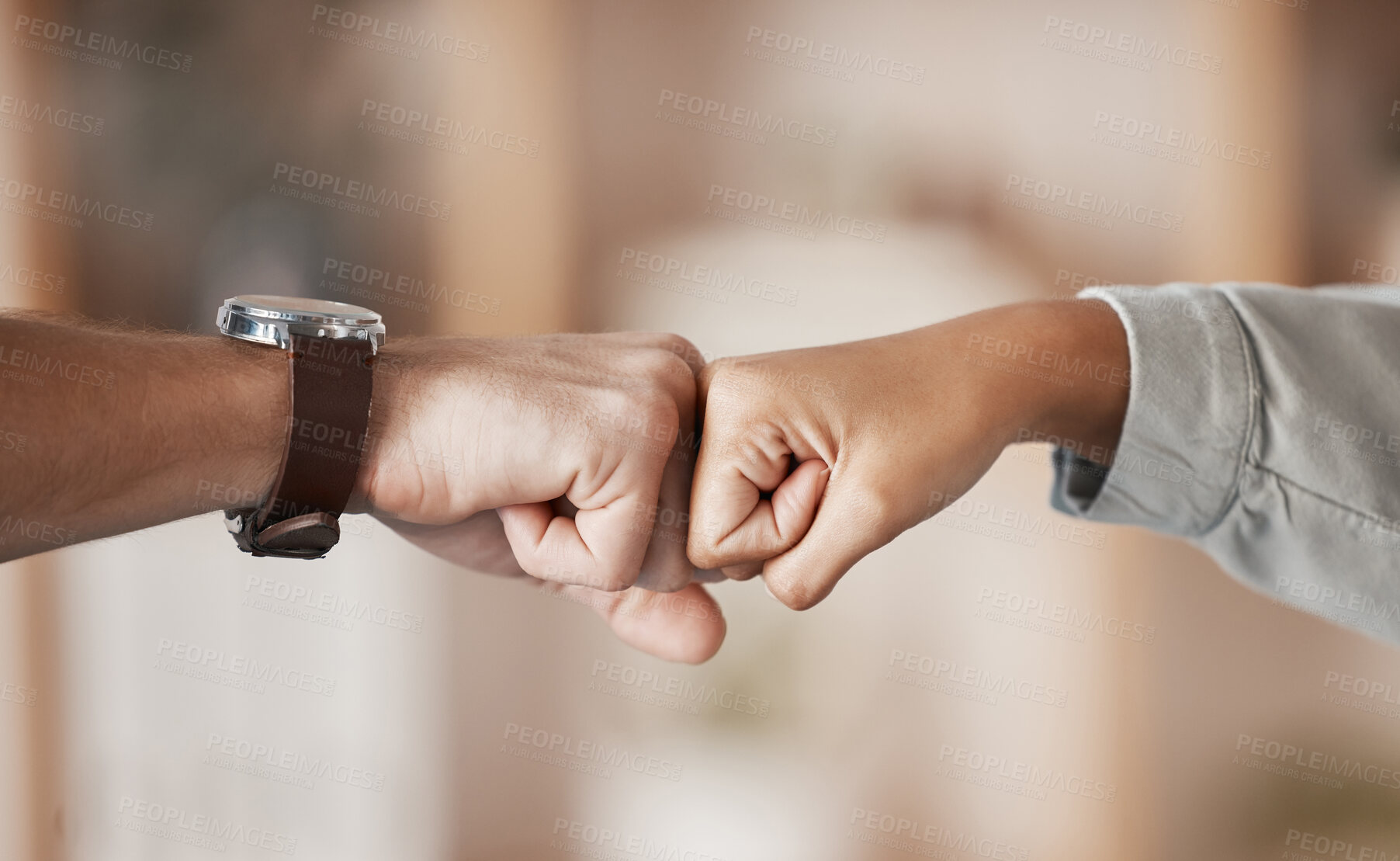 Buy stock photo Hands, teamwork and fist bump with a business man and woman fist bumping together in their office. Winner, goal and collaboration with a male and female employee celebrating a goal or target at work