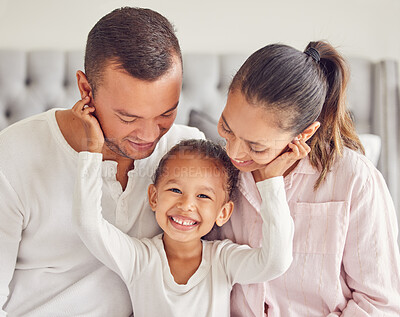 Buy stock photo Mother, father and girl in family portrait in house bedroom, home interior and bonding on a morning. Smile, happy and love bond parents or man and woman with young child in security, support or trust
