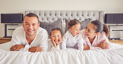 Buy stock photo Portrait of family in home bedroom, young kids smile on bed and mother laughing with girl baby happiness. Face of happy father, morning cuddle together and funny mama relax in pyjamas on weekend rest