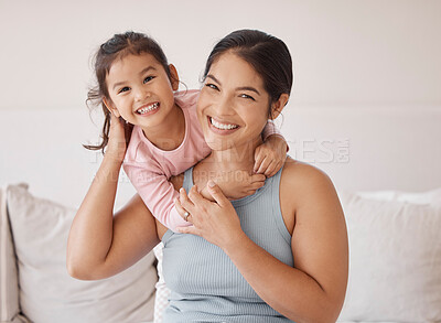 Buy stock photo Woman with happy girl, smile in bedroom with pajamas in morning on weekend or vacation. Asian mother with child on bed, express love and happiness, in room at holiday house or their family home