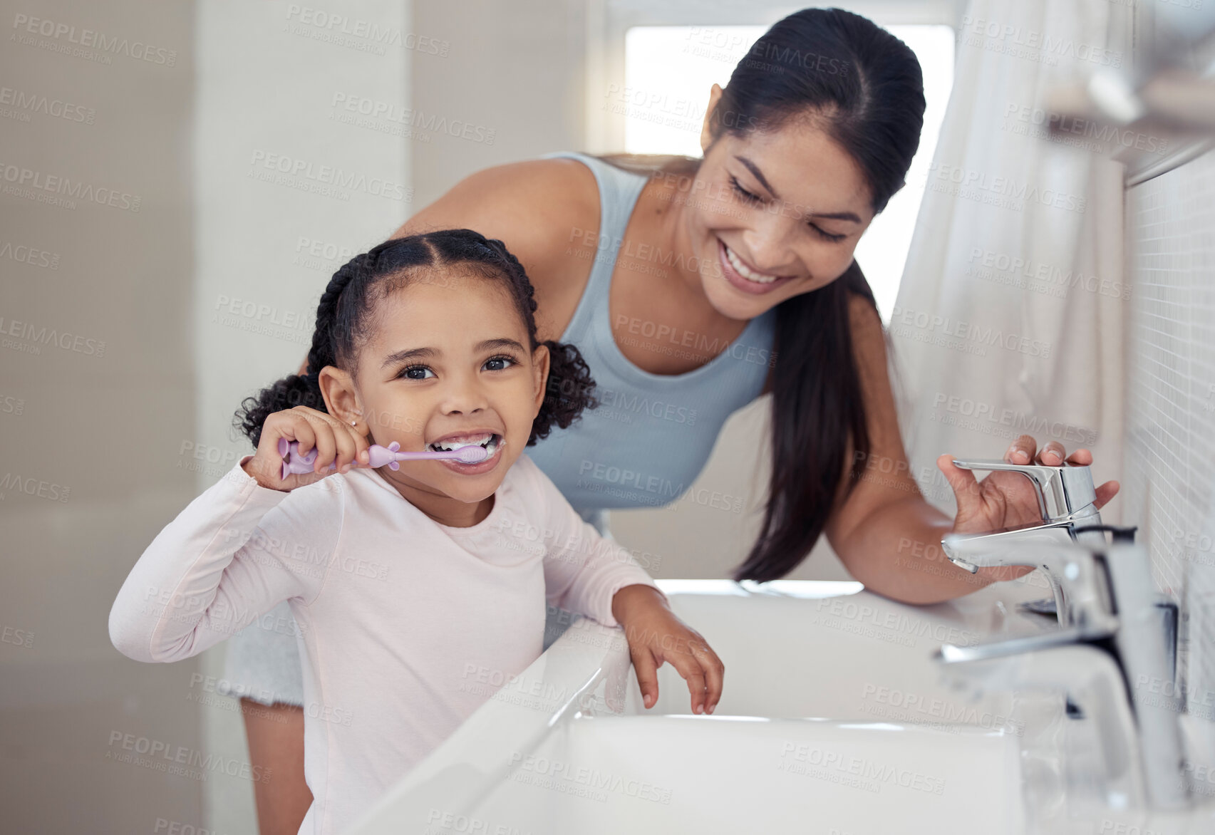 Buy stock photo Brushing teeth, girl or mother teaching learning child personal hygiene, dental care or healthcare in house or family home bathroom. Happy smile woman, parent and kid in wellness with sink toothbrush