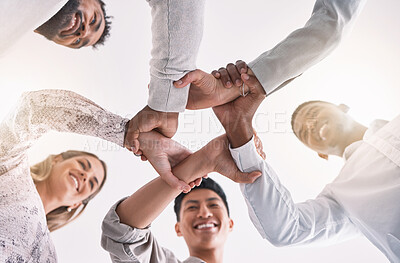 Buy stock photo Teamwork hands, wrist and unity in collaboration, motivation and support for success, vision and goals. Below of happy, diversity and solidarity staff in partnership, cooperation and trust together