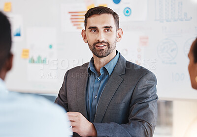 Buy stock photo Business man, marketing and accounting speaker in a team office meeting. Company worker presenter explain financial data and finance graph to a company strategy and work planning employee group 