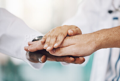 Buy stock photo Unity, teamwork and hands of medical doctors together to support each other in hospital. Diversity, medicine and group of professional healthcare workers in celebration of success or team motivation.