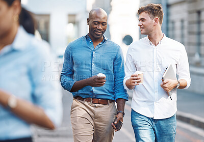 Buy stock photo Men, walk and street with takeaway coffee while talk, smile and relax at lunch break. Black man, colleague and diversity in city at tea time, walking to office or workplace in discussion or talking