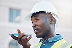 Communication, safety and a construction worker on phone call or sending voice note. A black man, engineer or builder on mobile at building site. Contractor working and talking on smartphone outdoors