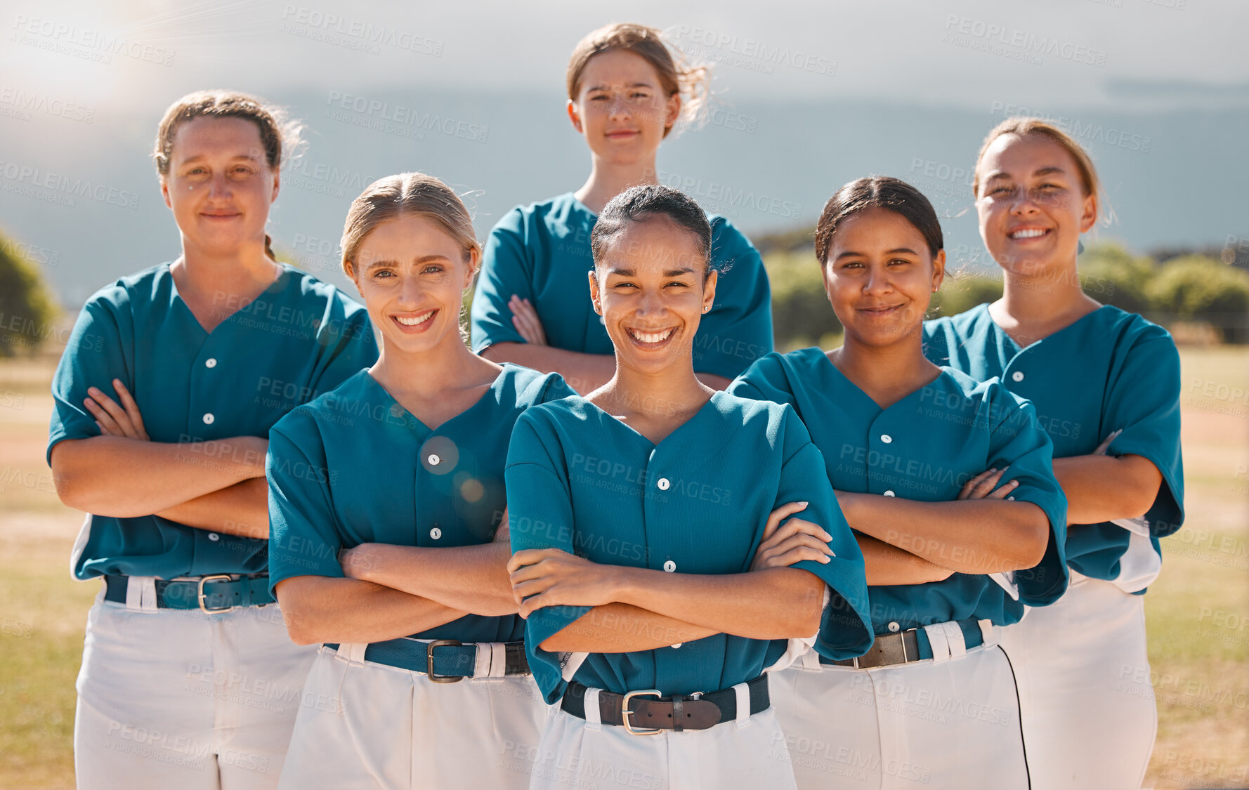 Buy stock photo Baseball, happy and women team with arms crossed on a sport field after practice or a game. Teamwork, collaboration and support with a proud group of girl athletes ready to support, win and play