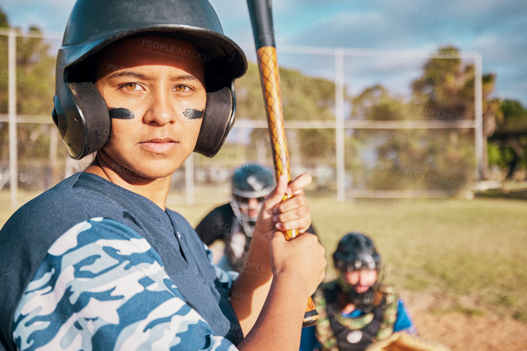 Buy stock photo Portrait of young girl on baseball field with bat, ready to hit the ball. Team player with paint on her face to show focus, determination and motivation for success and win in sports game