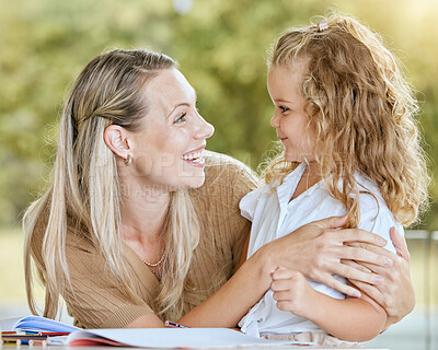 Buy stock photo Education, mother and child student writing school homework, learning knowledge and lesson in a notebook. Happy, smile and proud math tutor helping and teaching her creative child in the family house