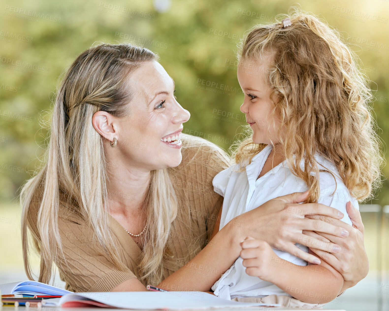 Buy stock photo Education, mother and child student writing school homework, learning knowledge and lesson in a notebook. Happy, smile and proud math tutor helping and teaching her creative child in the family house